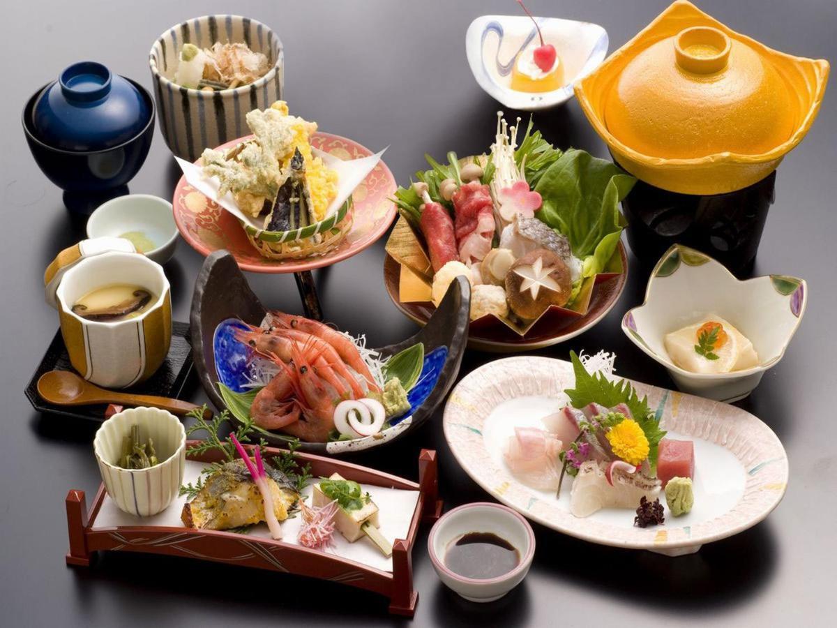 Awara Onsen Hot Spring Koubou Gurabaatei Hotel Bagian luar foto