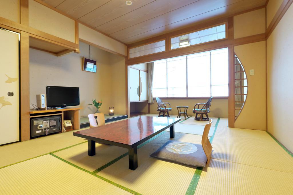 Awara Onsen Hot Spring Koubou Gurabaatei Hotel Ruang foto