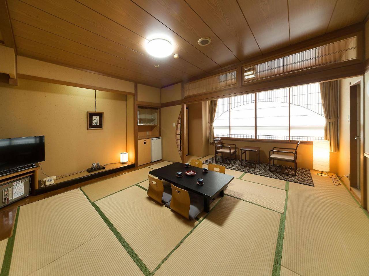 Awara Onsen Hot Spring Koubou Gurabaatei Hotel Bagian luar foto