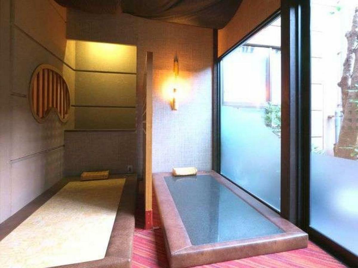 Awara Onsen Hot Spring Koubou Gurabaatei Hotel Bagian luar foto